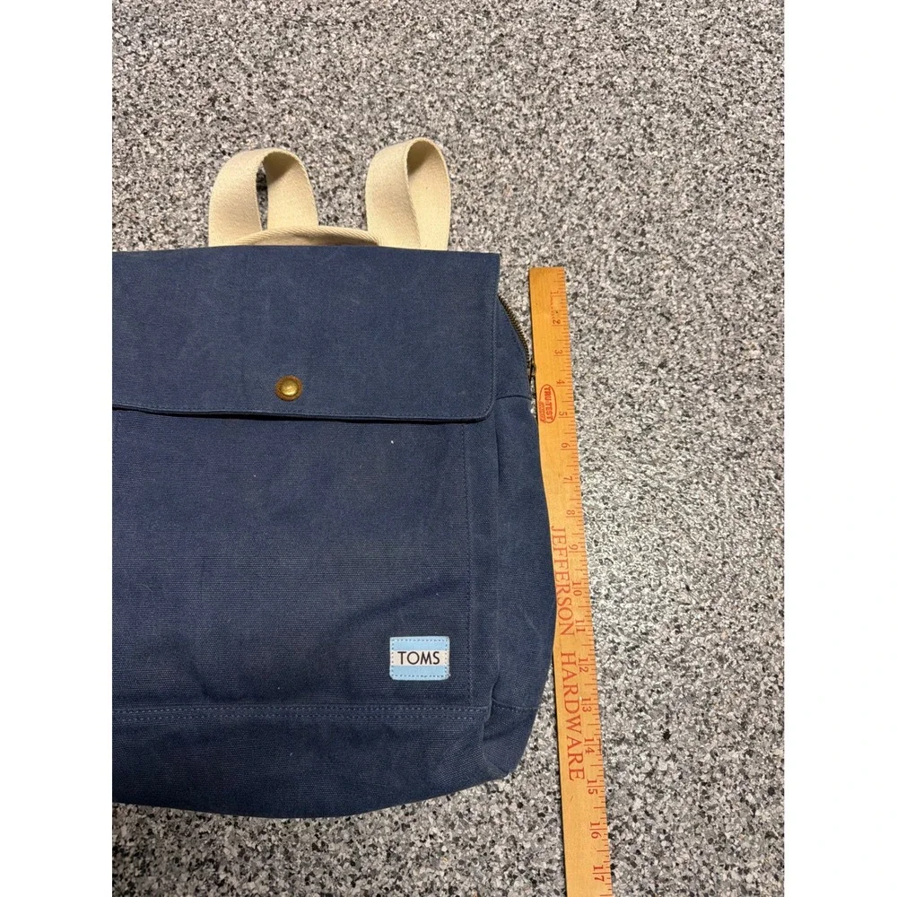TOMS Navy Blue Canvas Backpack Adjustable Straps Brass Hardware Carpe Diem